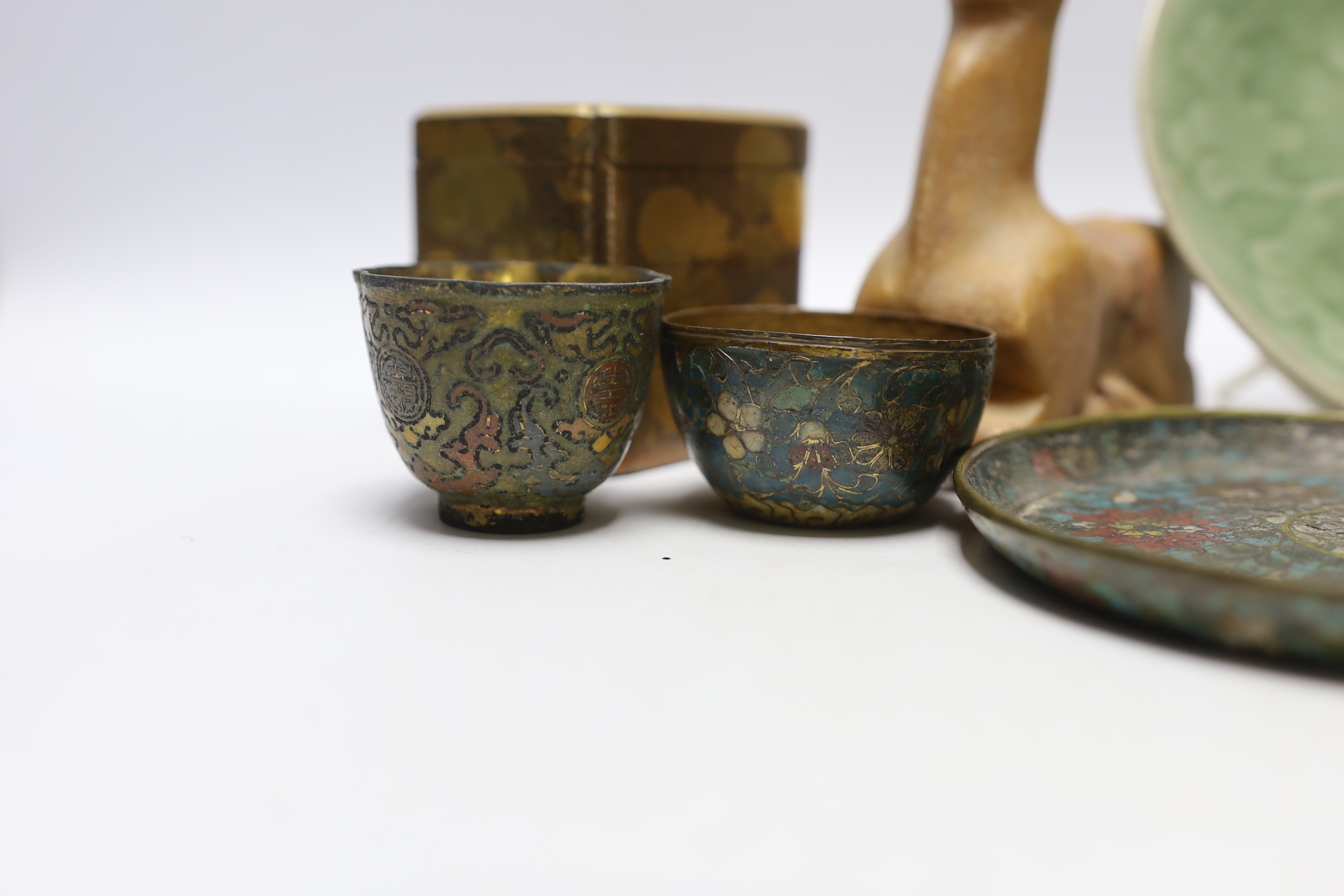 A Japanese lacquer three tier box and enamelled white metal miniature junk, gaming counters and sundries